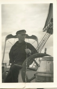 Image of Donald MacMillan at wheel